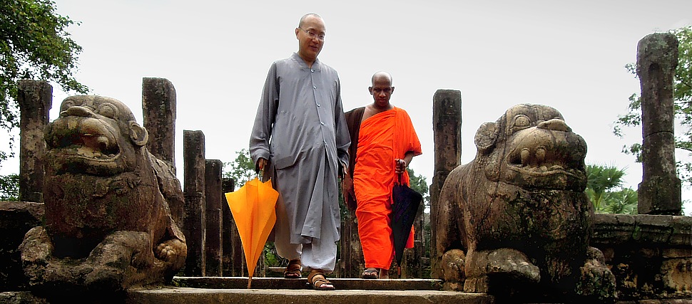 Buddhist Monks walking around the ancient City of Polonnaruwa