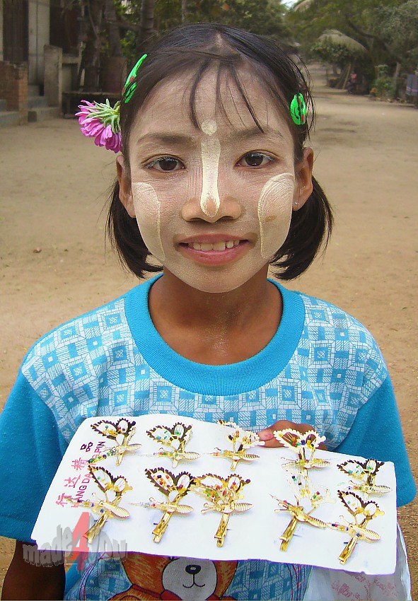 Burmese Girl sells golden butterflies