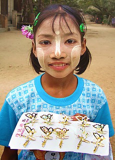 Burmese Girl sells golden butterflies