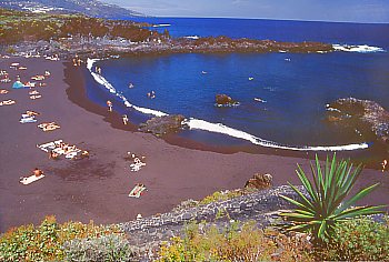 Black lava sand beach of Los Cancajos