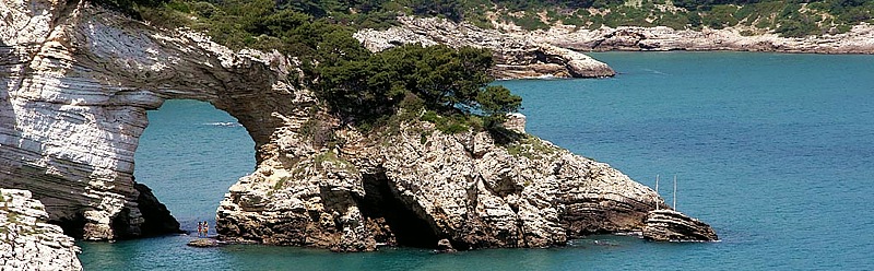 Natural arch Architiello San Felice in the cliffs between Vieste and Mattinata