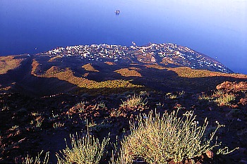 View from the Stromboli summit down to the village Stromboli with the offshore islets Strombolico