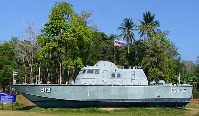 Police boat thrown inland by the force of the Tsunami waves