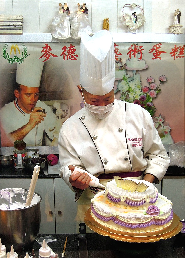 Sugar baker in Chinese pastry shop