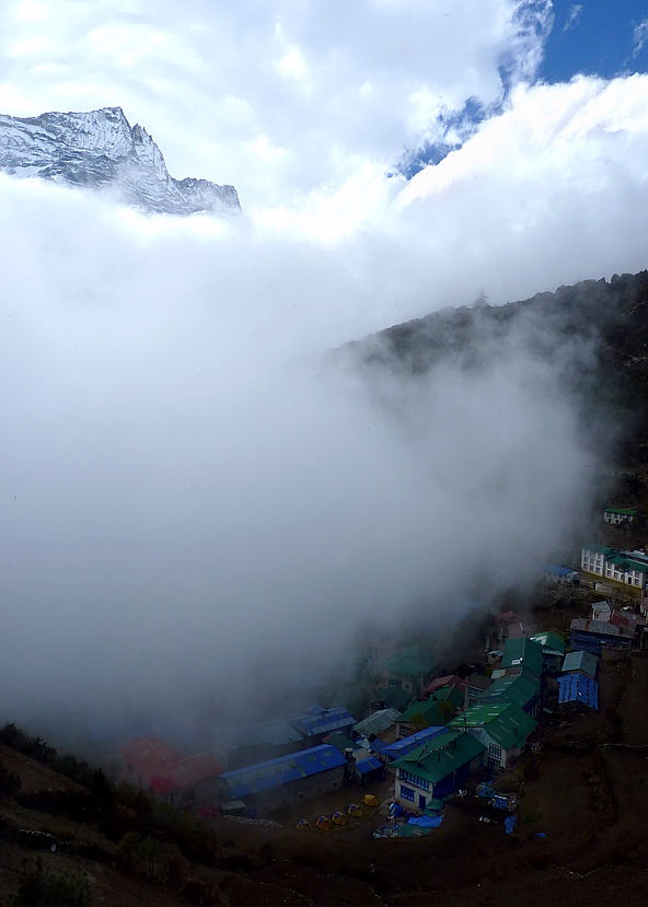 Fog moves over Namche Bazar (3450 m)