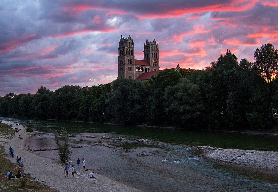 Fantastic pink Sunset on river Isar near St. Maximilian Church