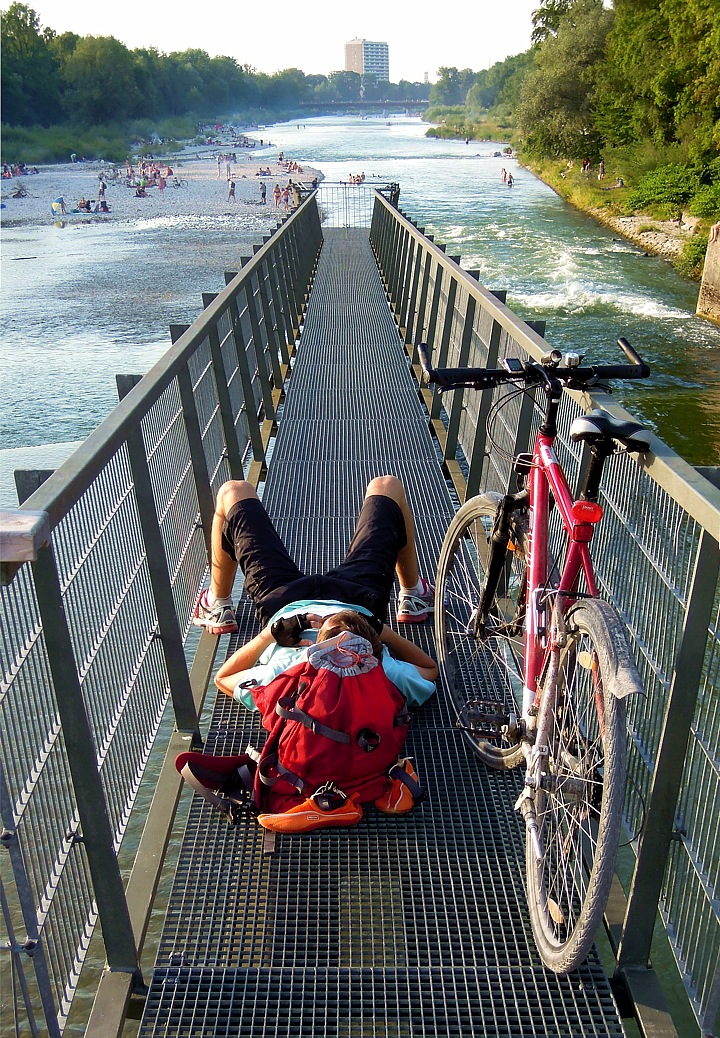 Mountainbike Relaxing on the Marienbridge at river Isar