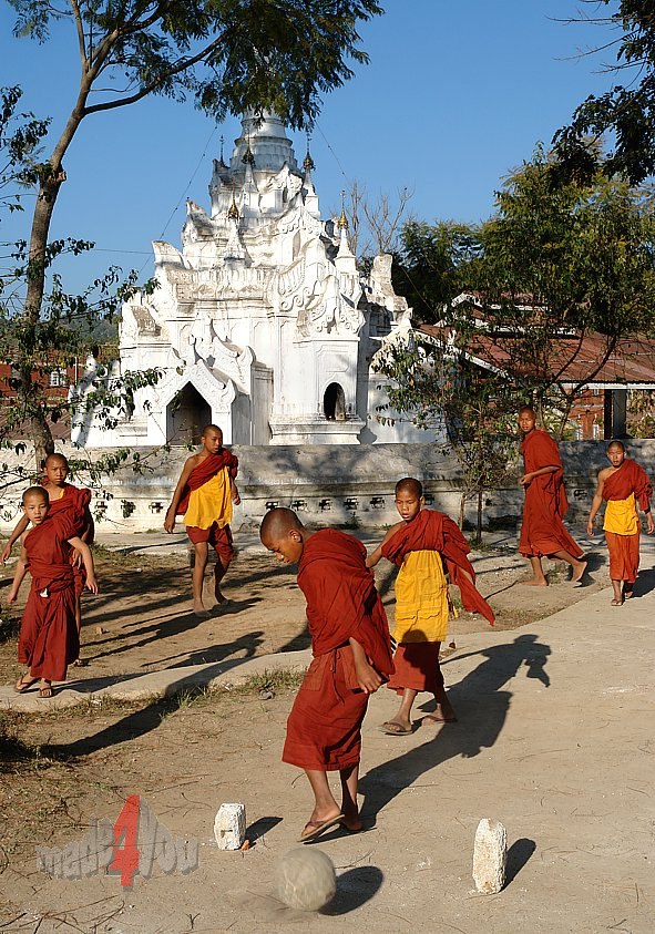 Football playing Monks in mountain village Kalaw near lake Inle Myanmar