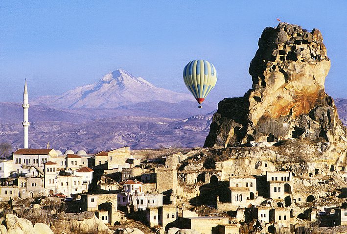 View on Uchisar and the snowcovered volcano Erciyes