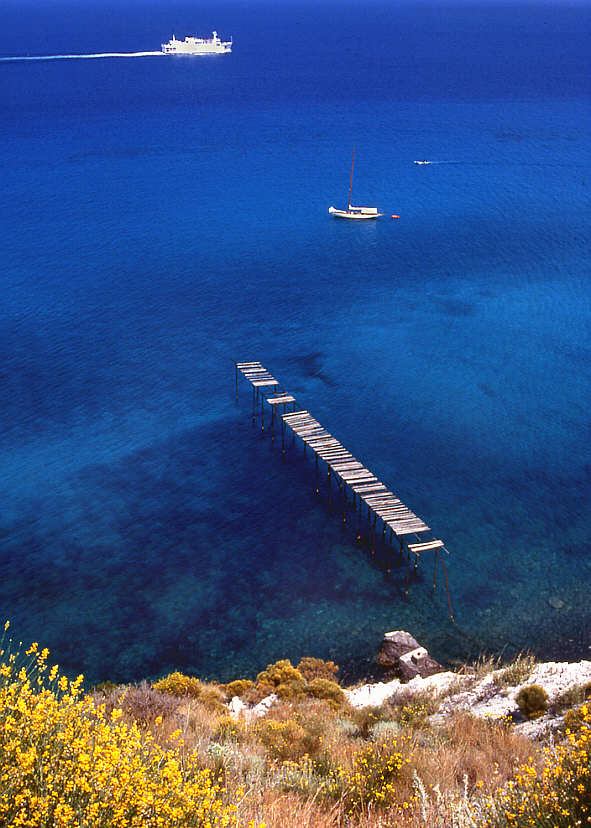 Lonesome pier at Capo Rosso