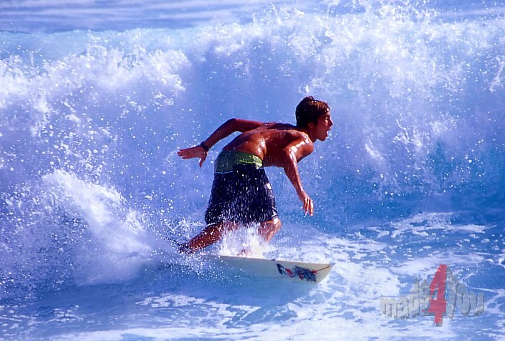 Wave surfer at Boucan Canot beach
