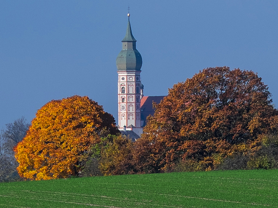 View from moraine hill downto Monastery Andechs in autumn