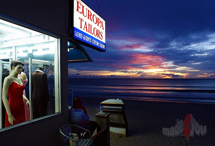 Tailors shop neonlights on the beach of Ko Lanta