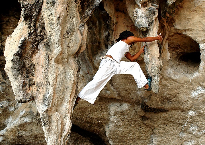 Climbing in the limestone rocks of Raileh