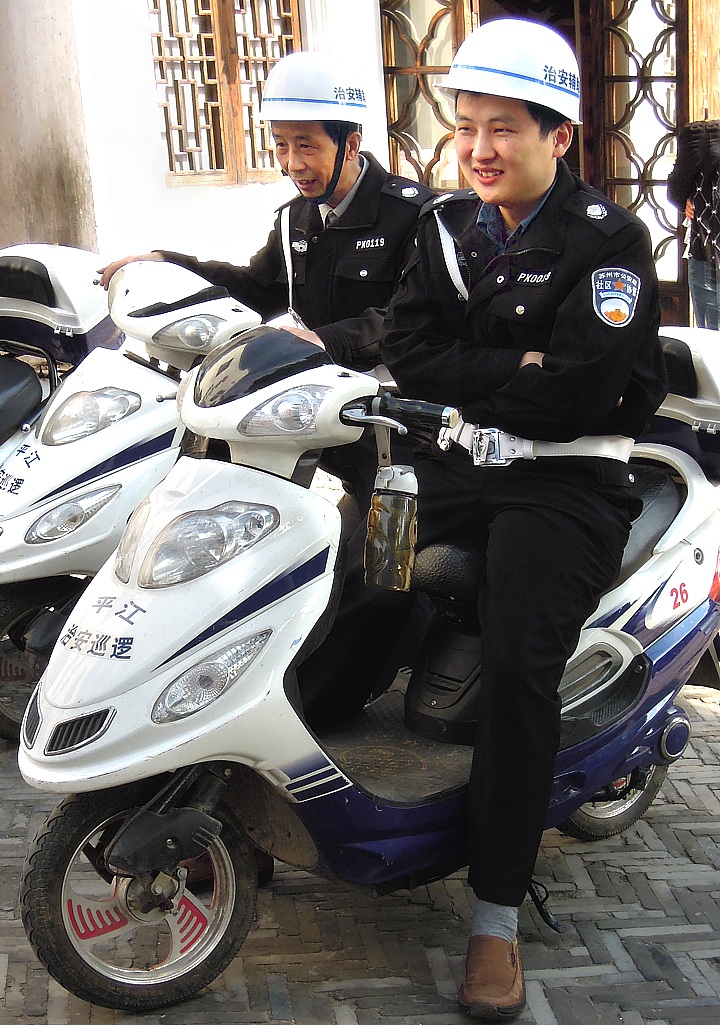 Chinese police on electric scooter in Suzhou