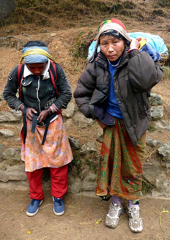 Poor Sherpa woman with daughter