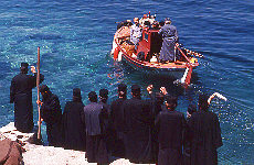 Monks wave to goodbye