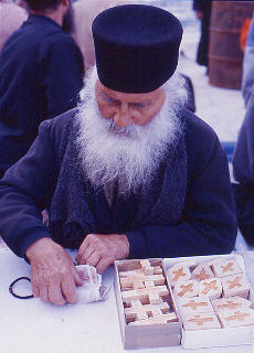 Old Monk sells crosses of roses wood