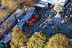 Market stalls at Kirchweihdult seen from the tower above Mariahilf church