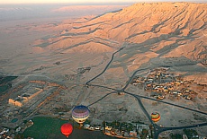 View downto Medinet Habu and into the Valley of The Kings