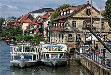 Excursion steamer on shore of river Regnitz