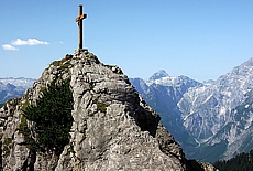 Priest heads on the trail to the High Plank mountain