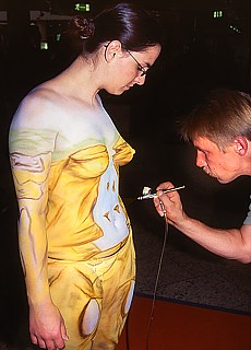 Bodypainting on naked young girl