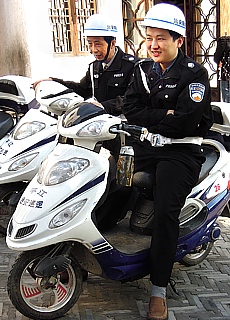 Chinese police on electric scooter in Suzhou