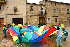 school children playing in historic alleyway of Parlav