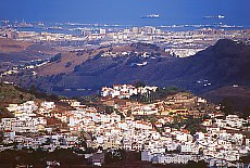 View from the Balcón de Zamora downto the pilgrimage village Teror and the capital Las Palmas