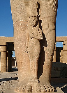 The wife of Ramses at his feet in Karnak Temple