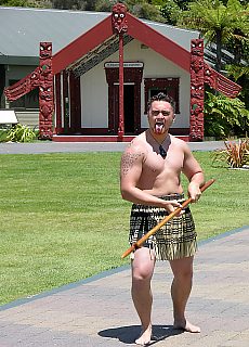 Threatening gesture of Maori warrior