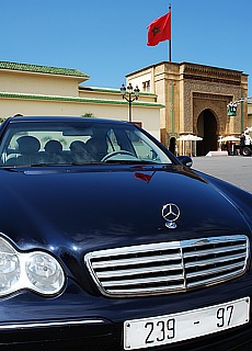 Executive Mercedes in front of the Royal Palace in Rabat