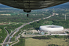 Zeppelin rear with Allianz Arena and mountain of rubble