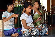 Lovely young girls at makeup in Shwedagon Pagoda