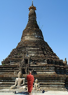 Monk with Buddha at Sakya Manaung Pagoda in Mrauk U