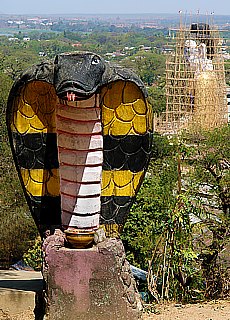 Sitting Buddha Hsehtatgyi with dangerous cobra in Pyay