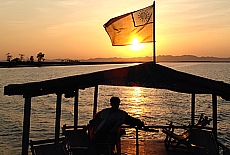Sunset cruising on Kaladan River to Mrauk U