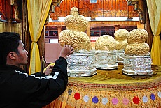 Golden Buddhas at Phaung-Daw-Oo-Monastery in Ywama