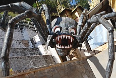 Giant Spider guards the entrance of flowstone cave Pindaya