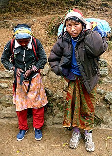 Poor Sherpa woman with daughter