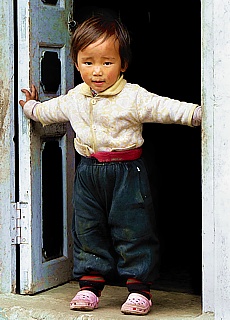 Small nepali boy on the way to Namche Bazar