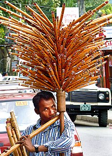 Nepalese flute player in Pokhara