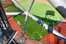 Steep view down onto the green playing field