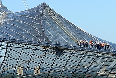 Guided tour walking on the Olympia tentroof