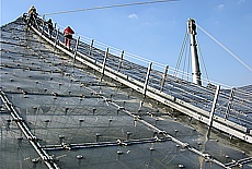 Plexiglas panels with rubber bumps on the Olympia tentroof