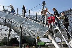 Climbing up the Olympia tentroof