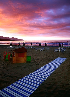 Sunset on the sandy beach of Castellamare del Golfo