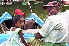 Proud grandfather with granddaughter in Negombo