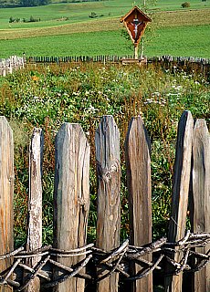 Traditional bonded wooden fence at Weberhof in Toblach